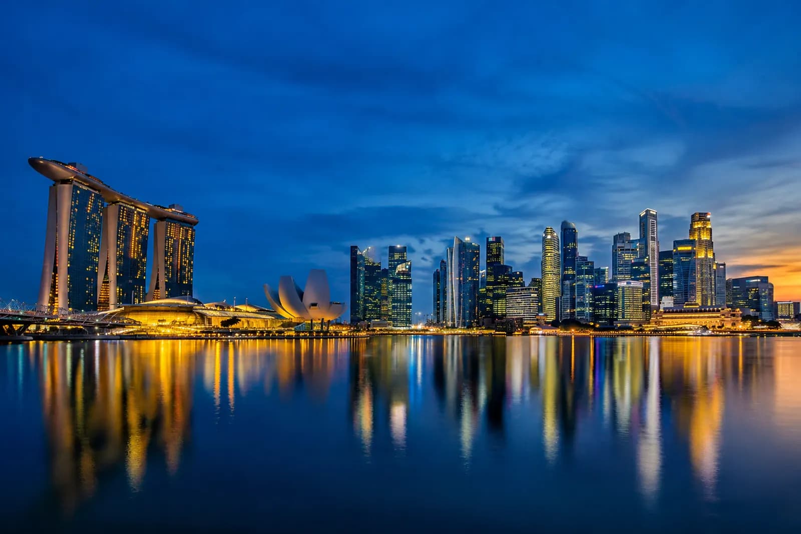 Singapore’s central business district across the bay at blue hour